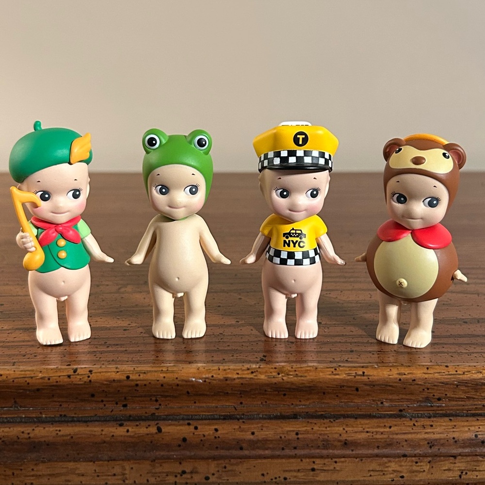 Sonny Angel Lot of 4 Sonny Town Musician, NYC Yellow Taxi Cab, Frog, Raccoon Dog